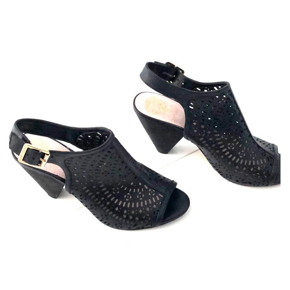 Perforated black leather come heel sandal